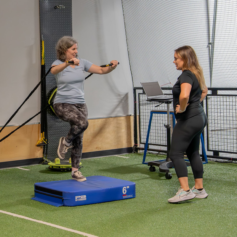emily with patient on step up