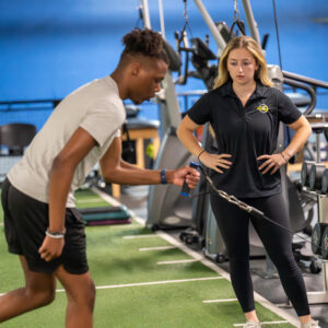 trainer and person exercising