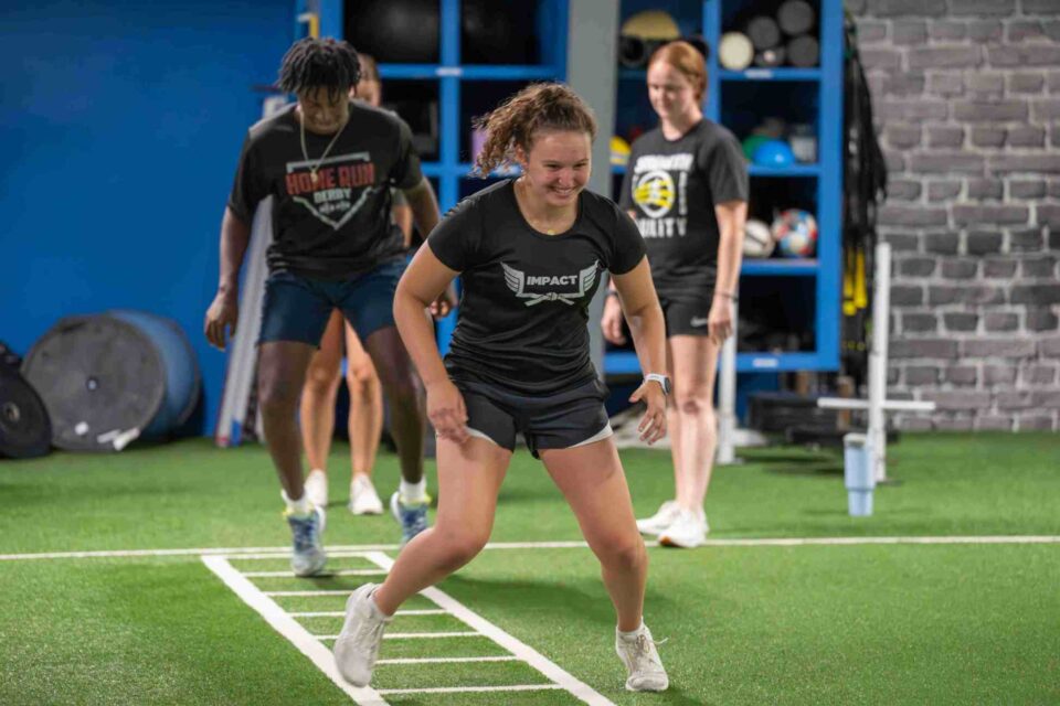 Group agility ladder drill at Elite Sports Performance & Physical Therapy